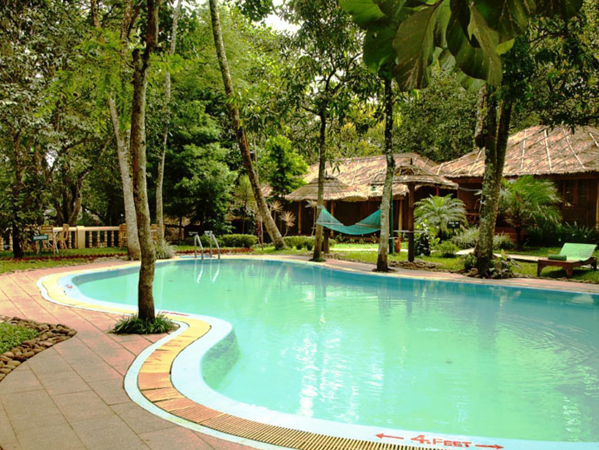 Woods N Spice - Thekkady Hotel Kumily Bagian luar foto