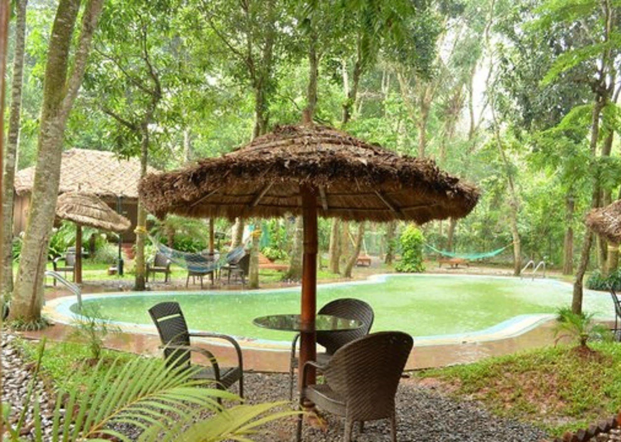 Woods N Spice - Thekkady Hotel Kumily Bagian luar foto